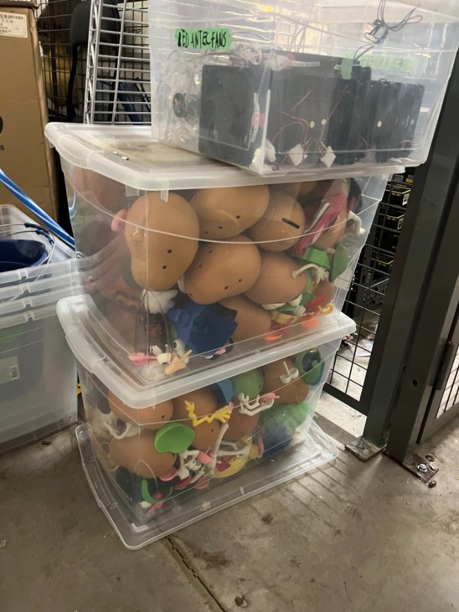 Bin of Mr. Potato Head parts, misc.