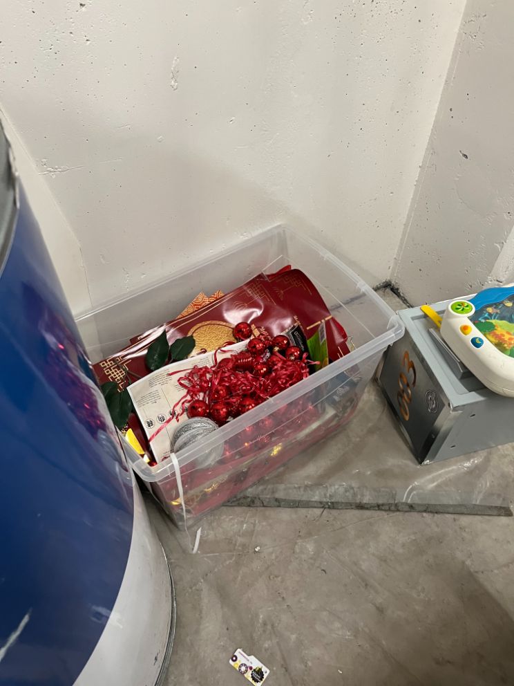 Bin of Lunar New Year décor, misc.