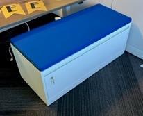 Metal Low storage w/blue cushion top/ 18" x 42"