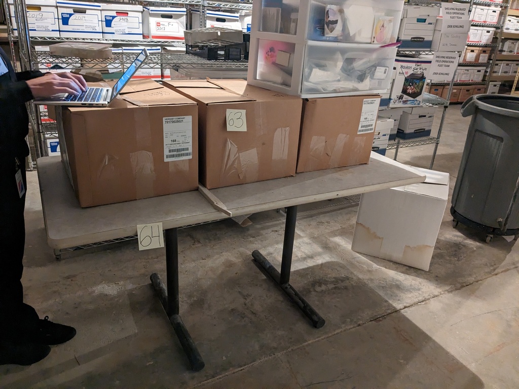 table w/ metal bases (2'x5'x2.5')