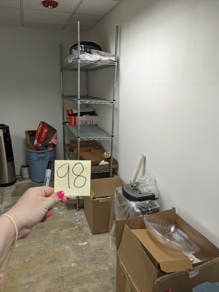 misc contents/boxes in storage room (paper plates, bowl, etc.)