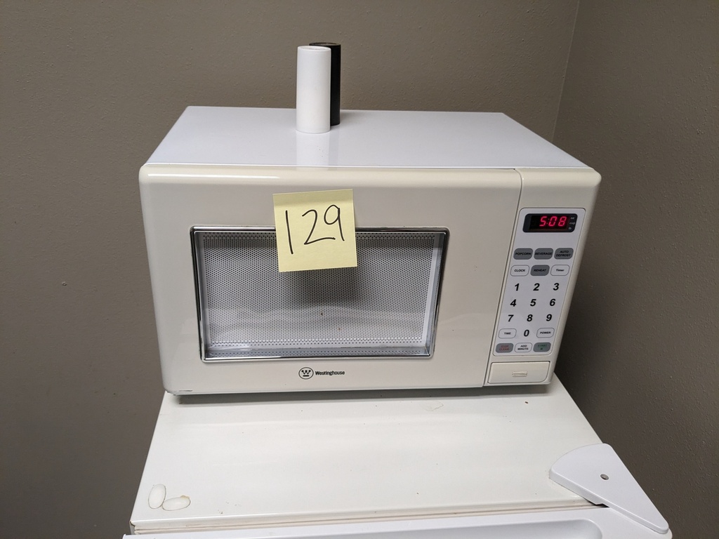 small scale countertop microwave, white