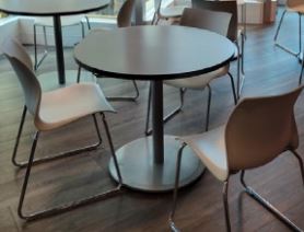 Teknion table, silver top, disc-base, 36" D