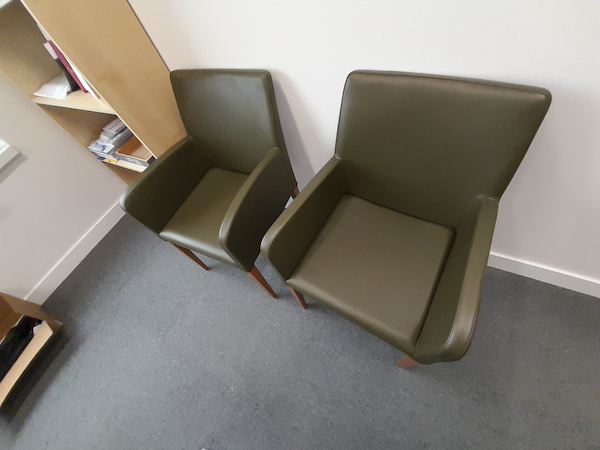 Green small leather armchair