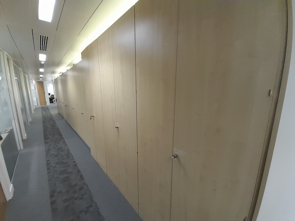 Tall brown wall unit cupboard