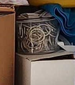 Container of Binder Rings