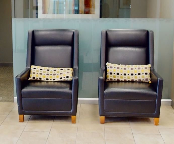 Black tall-back lounge chair