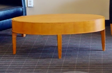 Oval wood coffee table