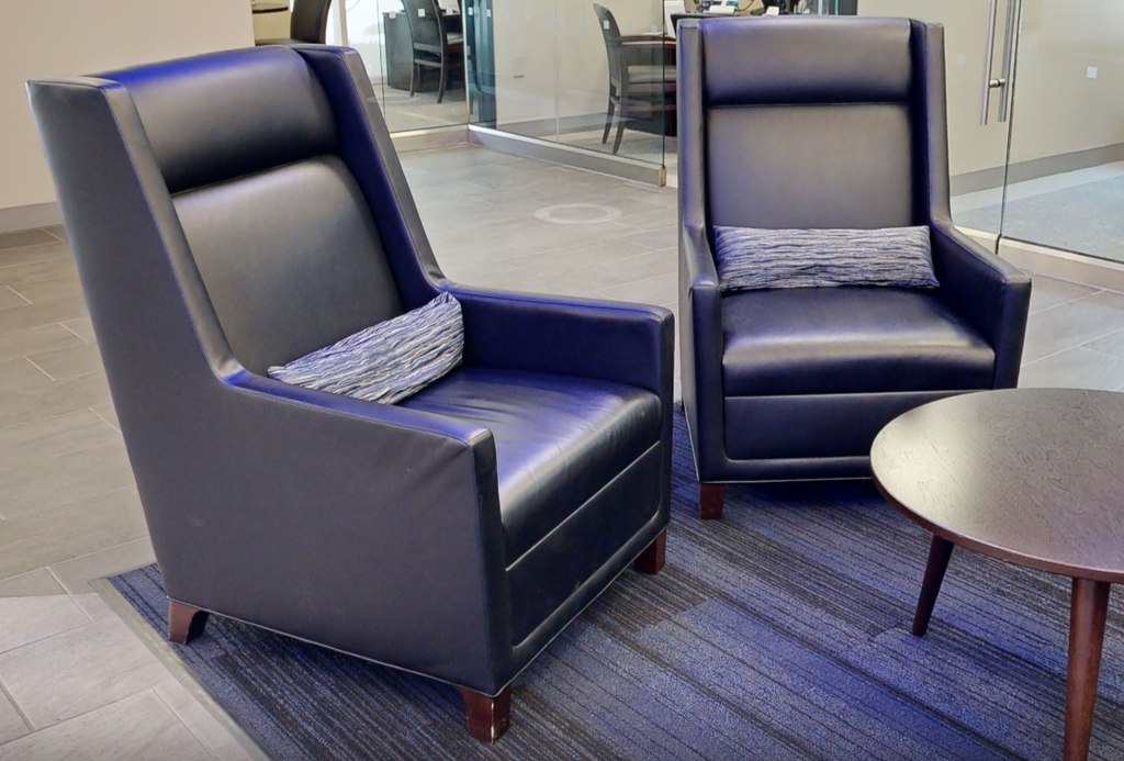 Black tall-back lounge chair
