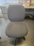 Grey armless task chair