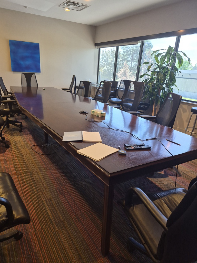 Dark wood board room table