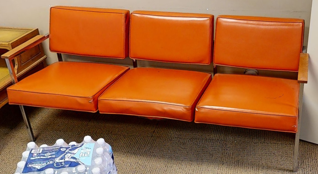 Orange 3 seat couch