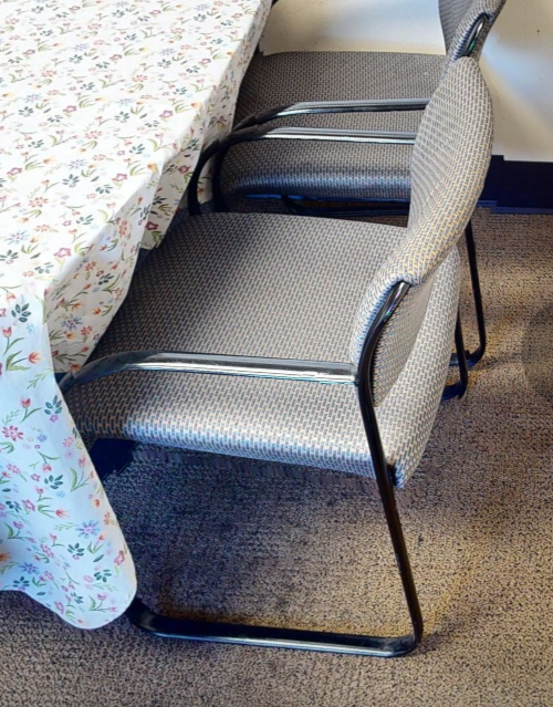 Grey metal guest chair
