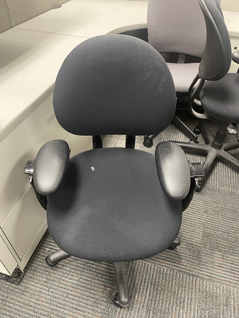 Black cushioned seat and black round back chair