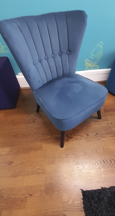 Blue velvet button back sofa chair