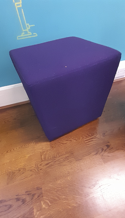 Purple fabric soft cube pouffe seat