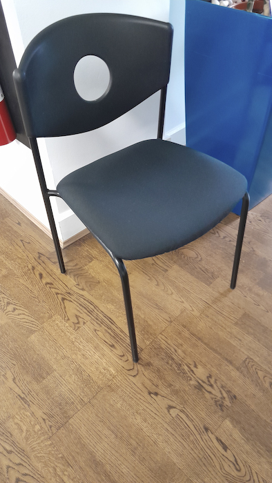 Black plastic meeting chair 