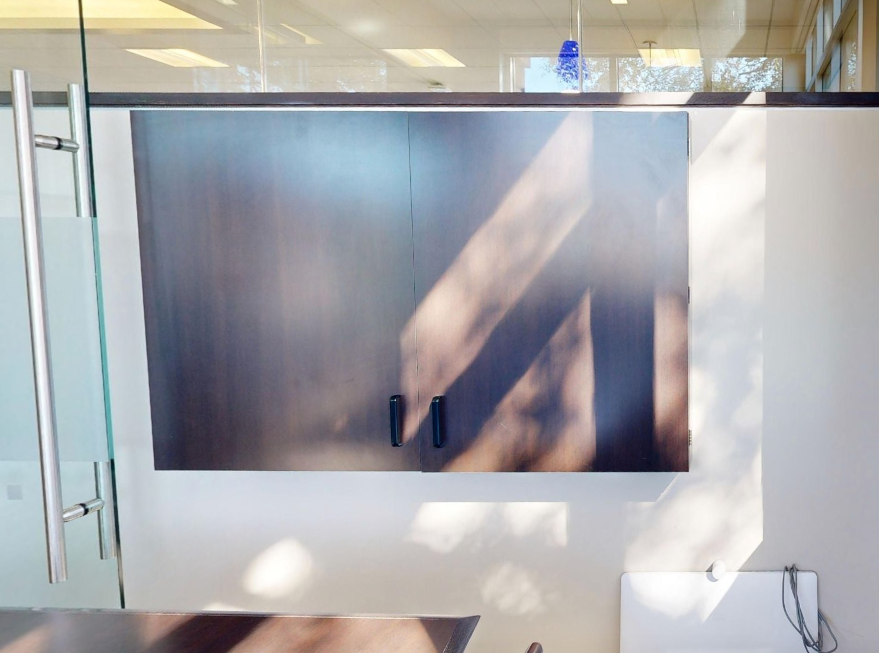 Whiteboard in mounted cabinet