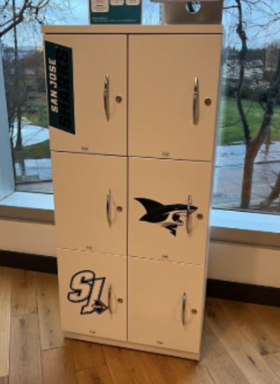 White lockers w/San Jose Sharks stickers (no keys, but all unlocked)