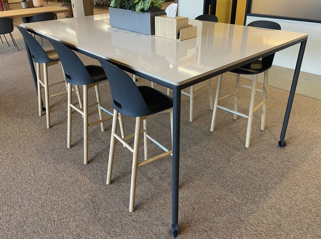 Bar height table on casters with whiteboard top