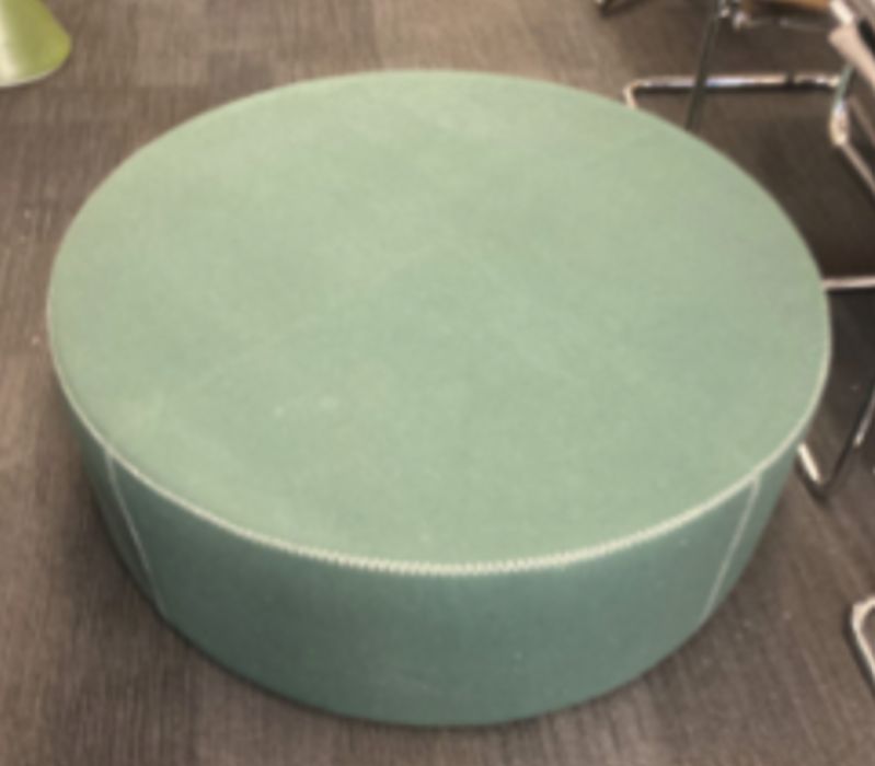 Large green ottoman