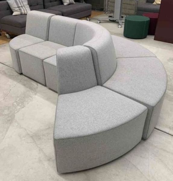 Curved grey sectional