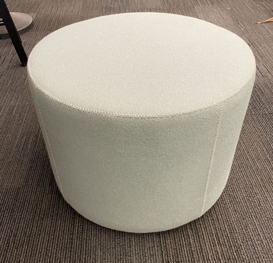 Round light green ottoman