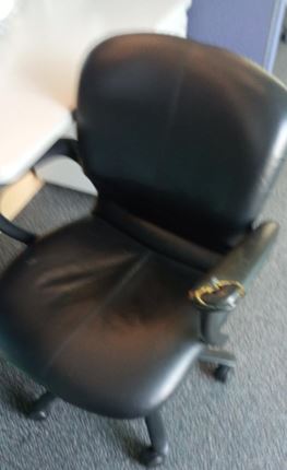 Task chair, black vinyl | Silla operativa, vinilo negro