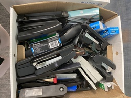 [#I2-35] Box of Staplers and Supplies