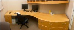 [#E6-21] L-shaped desk, long on right side