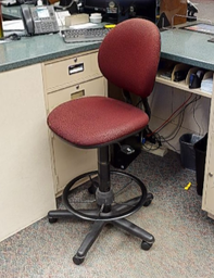 [#B12-6] Red teller task chair no arms