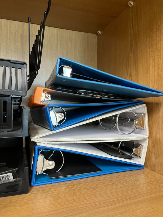 Box of binders, misc.