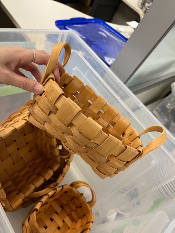 Bin of wicker baskets