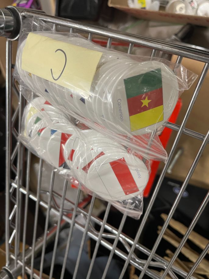 Bin of country-themed buttons, misc.