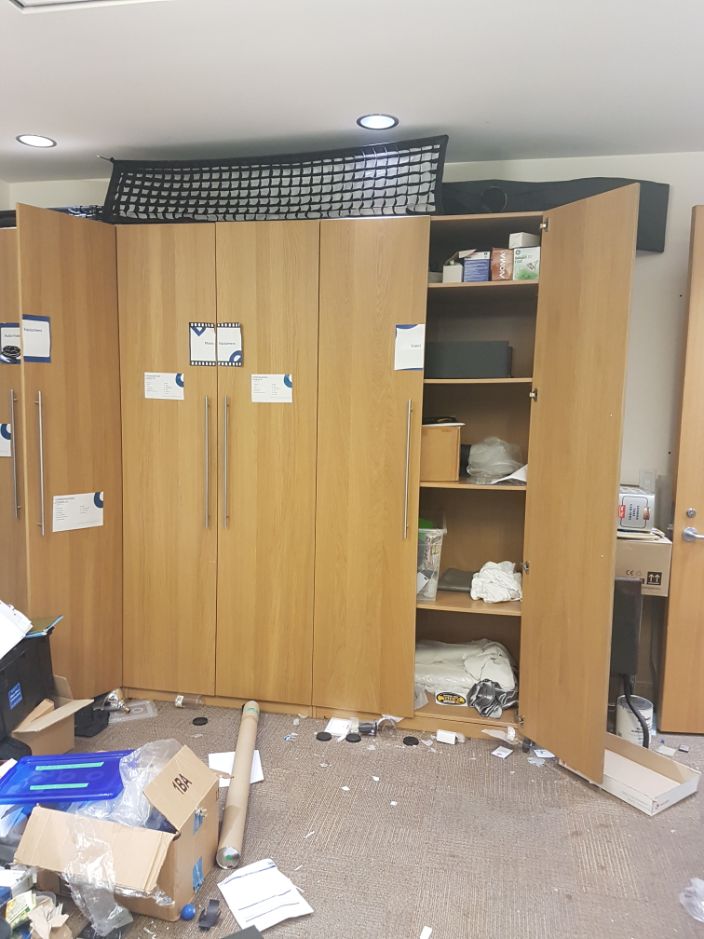 Tall wood storage cabinet