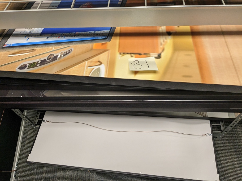 metal rack contents (pictures, canvas, etc.)
