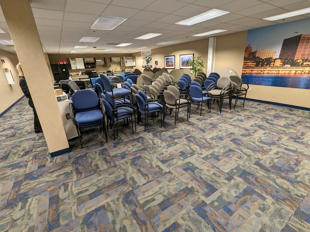 stackable guest chairs, fully upholstered, fixed loop arms