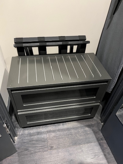 Luggage rack with shoe drawers