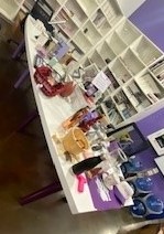 Conference table, white top, purple legs