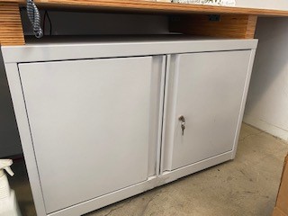 Metal gray storage cabinet