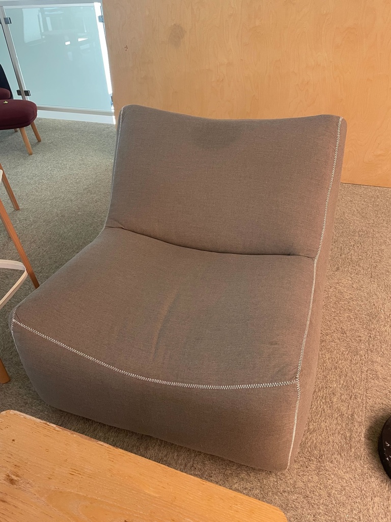 White Lounge Chair (photo representation)