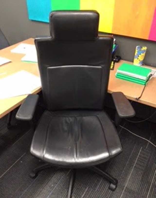 Black Task Chair with a Head Rest