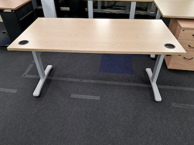 Light wood effect tables on wheels