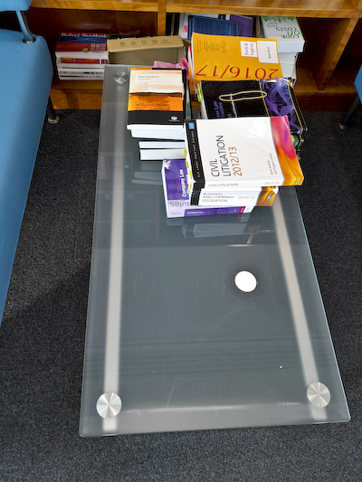 Low glass top coffee table