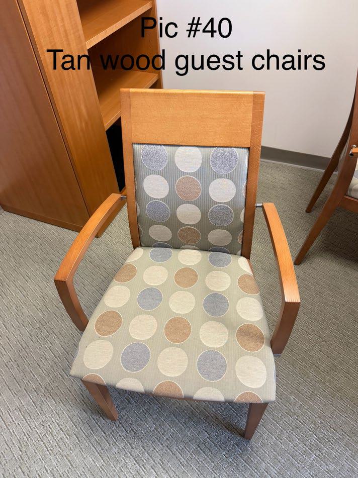 Tan wood guest chairs