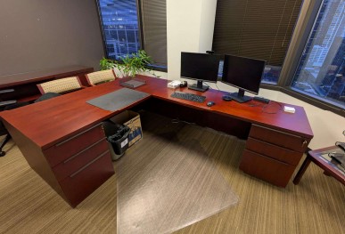 24" d x 72" w wood desk with 24" x 60" return