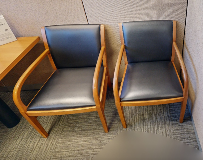 Black guest chair with arms