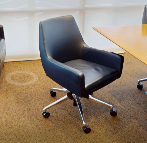 Black conference chair with casters