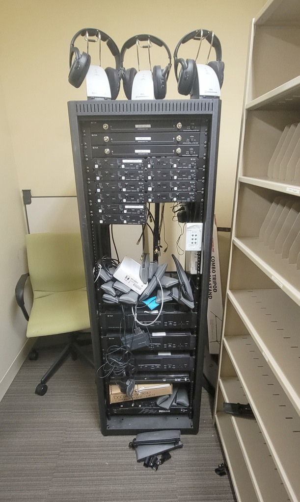 Floor standing unit w/3 sennheiser TR-136 headphones