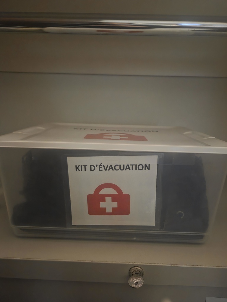 misc reception area - placks/Picture/garbage bags/evacuation kit/book